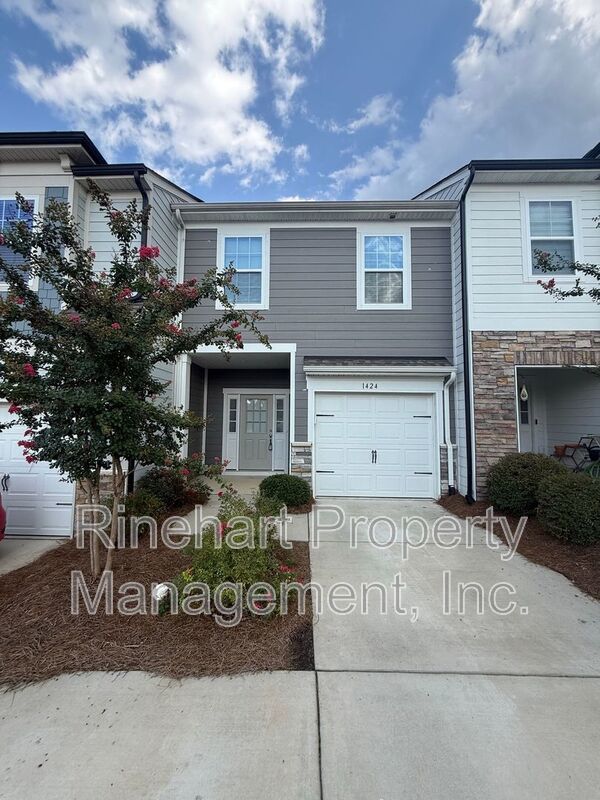 3BR/2.5BA Townhome in Paddlers Cove | Garage, Lake Access, Lawn Care Included property image