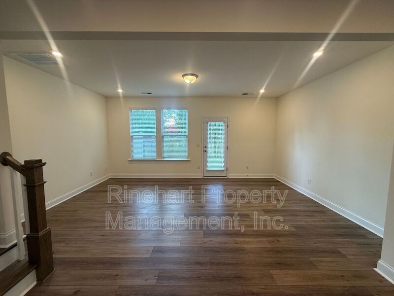 3BR/2.5BA Townhome in Paddlers Cove | Garage, Lake Access, Lawn Care Included property image