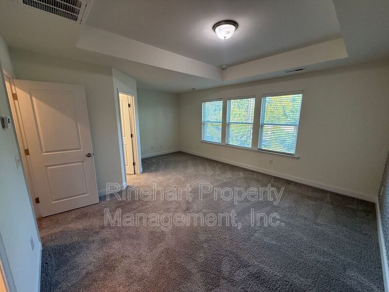 3BR/2.5BA Townhome in Paddlers Cove | Garage, Lake Access, Lawn Care Included property image