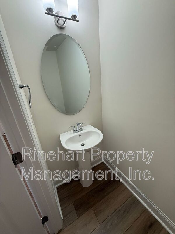 3BR/2.5BA Townhome in Paddlers Cove | Garage, Lake Access, Lawn Care Included property image