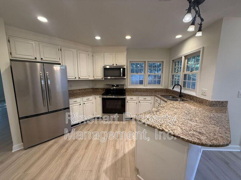 Open-Concept 3BR/2BA in Tega Cay | Vaulted Ceilings, Double Garage, Fort Mill Schools property image