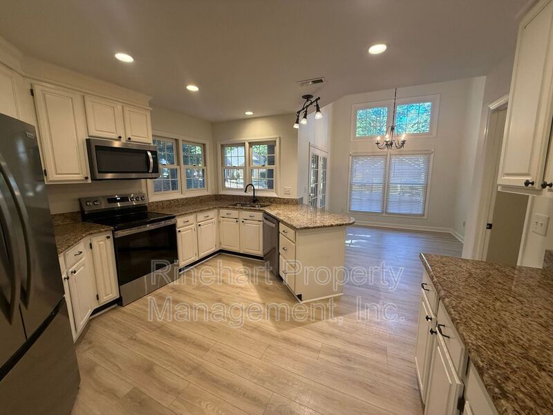 Open-Concept 3BR/2BA in Tega Cay | Vaulted Ceilings, Double Garage, Fort Mill Schools property image